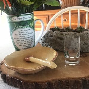 Handmade dish with serving spoon